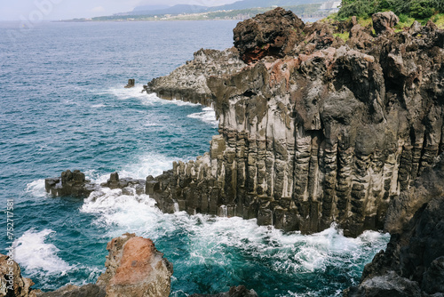 The Daepo Jusangjeolli (Jusangjeollidae) basalt columnar joints and cliffs at Jeju Island, South Korea. photo