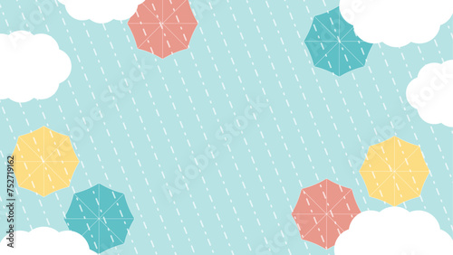 真上から見たカラフルな傘と雨雲のある空の背景素材　コピースペースのある横長の素材