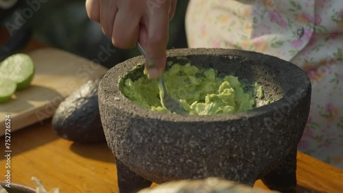 SLOW MOTION: GUACAMOLE PREPARATION 2  photo