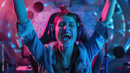 A Female eSports gamer rejoices in the victory in Neon game room background. high quality image