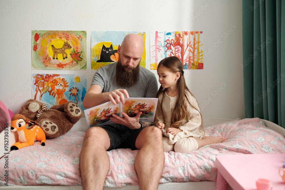 Poster Bearded Man With Open Book Of Comics With Pictures Sitting On Poster Bearded Man With Open Book Of Comics With Pictures Sitting On