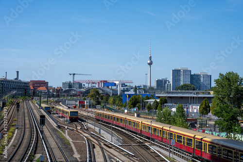 Local commuter trains in Berlin, Germany, with the famous TV Tower in the back