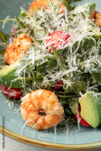 Portion of gourmet caesar salad with shrimp photo