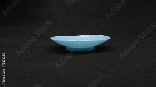 Blue small plate isolated