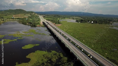 Wallpaper Mural Aerial view of the long bridge build for crossing Nong Luang the largest lake in Wiang Chai district of Chiang Rai province of Thailand. Torontodigital.ca