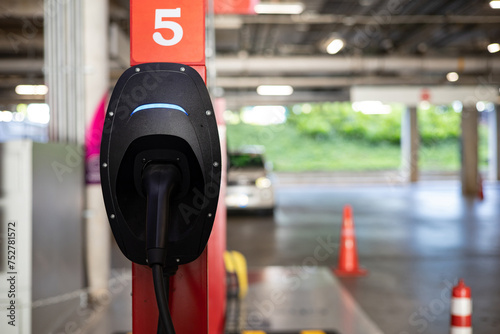 Wallpaper Mural Electric vehicle charging station in the parking lot except the copy area Torontodigital.ca