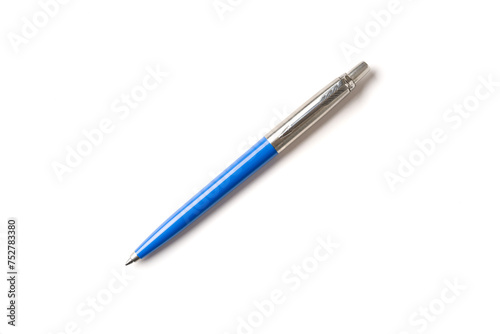 Blue plastic and metal ballpoint pen on white isolated background