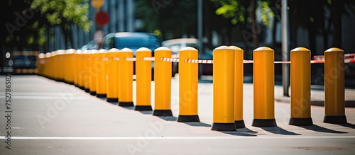 Vibrant array of yellow security barriers blocking access to a construction site