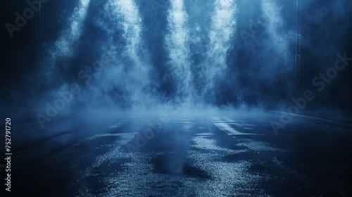 Dark street, wet asphalt, reflections of rays in the water. Abstract dark blue background, smoke, smog. Empty dark scene, neon light, spotlights. Concrete floor 