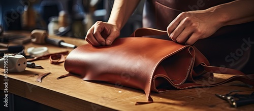 Craftsman Working on Handmade Leather Bag - Artisan Creating Stylish Vintage Purse