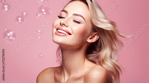 Blissful Blonde Woman with Airy Waves and Soap Bubbles on a Pink Background