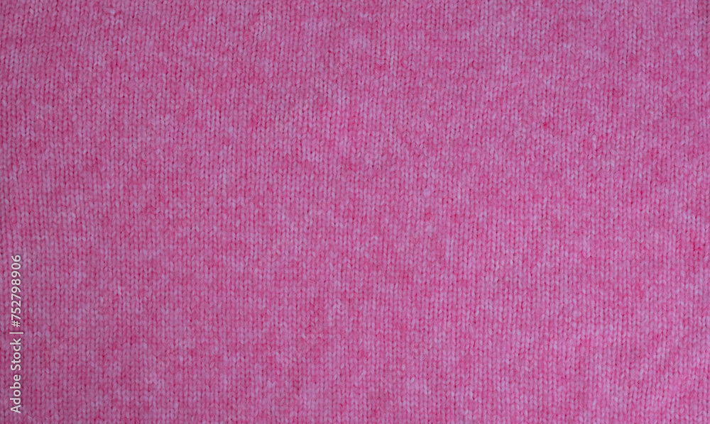 Fototapeta premium Pink weißer Grobstrick Woll Pullover aus Alpaca und Mohairwolle zur Hintergrund Nutzung