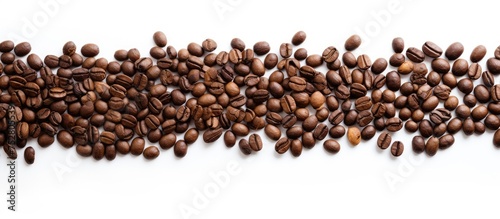 Scattered Coffee Beans Creating a Rich Visual Texture on Crisp White Background