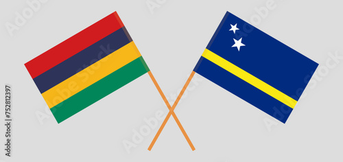 Crossed flags of Mauritius and Country of Curacao. Official colors. Correct proportion