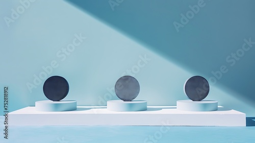 three concealed circles on stages on white surface against blue background photo