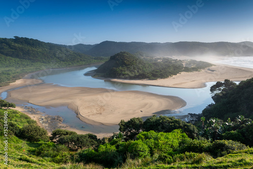 Wild Coast, known also as the Transkei, open beaches, steamy jungle or coastal forests. The rugged and unspoiled Coastline South Africa photo