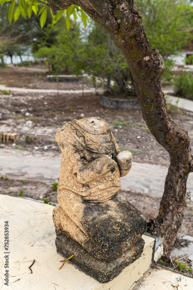 Weathered Stone Sculpture in Tropical Setting Weathered Stone Sculpture in Tropical Setting