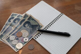 現金と空白のノート
