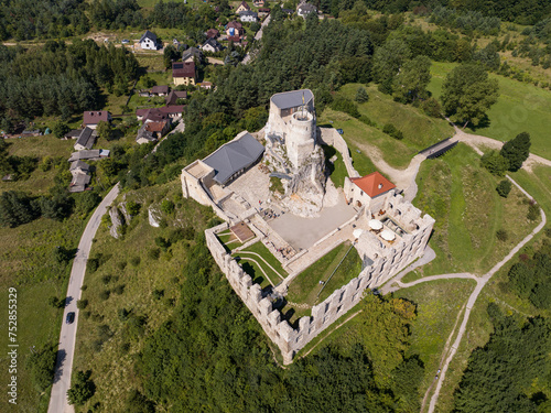 Ruins of medieval royal Rabsztyn Castle in Poland. Rabsztyn Aerial view in summer. Rabsztyn, Poland. Ruins of medieval royal castle on the rock in Polish Jurassic Highland.  photo