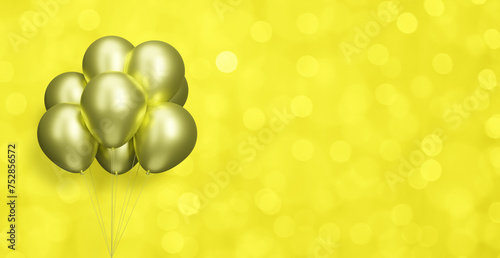Bunch of gold balloons on blurred yellow background. Empty space for text. 3d rendering