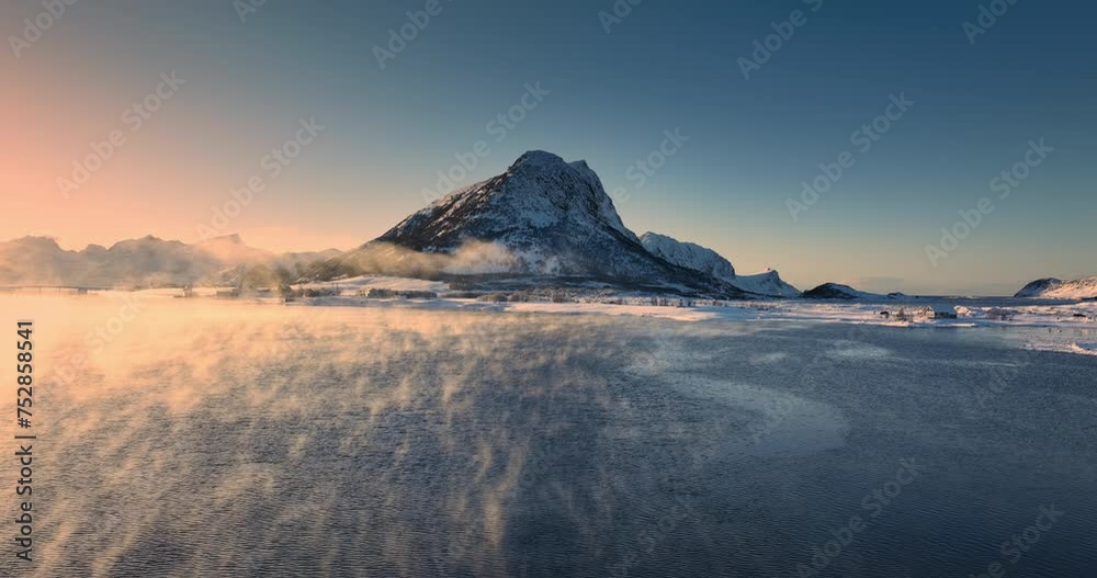 Scandinavian polar landscape of Lofoten islands, fog over rocky sea shore Norway Scandinavian polar landscape of Lofoten islands, fog over rocky sea shore Norway