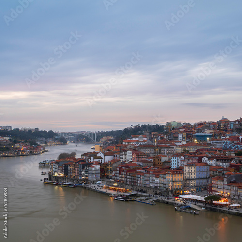 view of Old Porto Oporto city and Ribeira over Douro river from Vila Nova de Gaia, Portugal © parkerspics