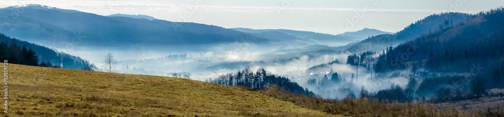 fog over the mountain valley