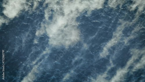 Birds Eye View Of Mist And Fog Being Swept Over Water In Norway. Aerial Descending Shot photo