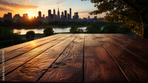Empty wooden table top with blur background of nature skyline.