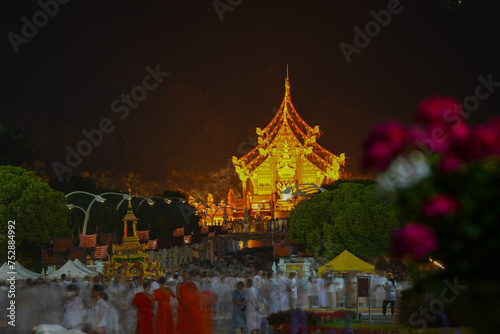 A lot of people come to worship Buddha relics celebration and do candlelight procession  at Hot kham luang royal park rajapruek chiangmai thailand December 5 2024 photo