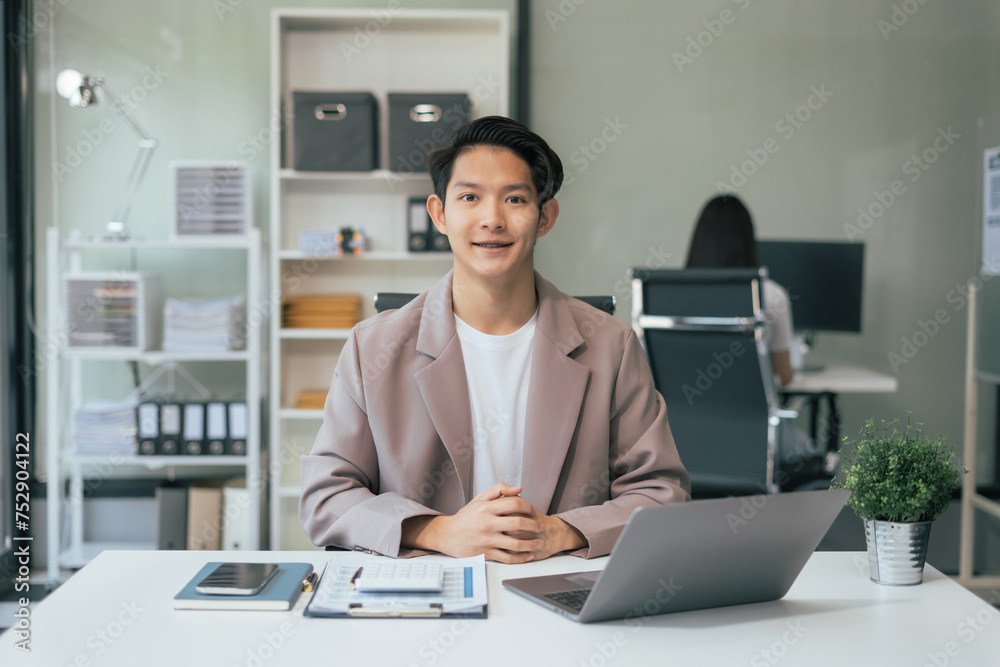 Smiling confident mature businessman leader looking at camera in office. Smiling confident mature businessman leader looking at camera in office.
