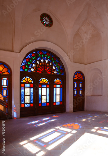 Five door room in the traditional Iranian house known as Tabatabei House, in Kashan, Iran photo