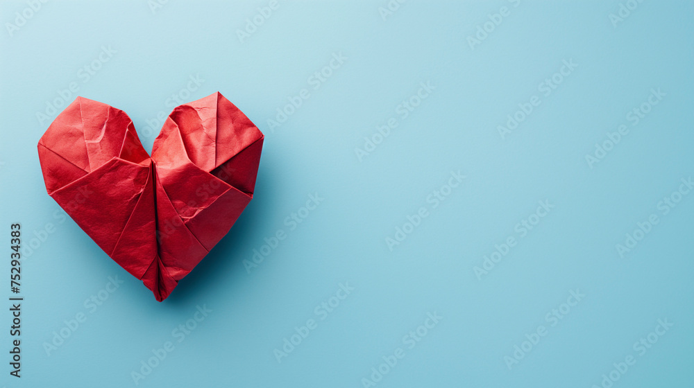 Corazón rojo hecho con papel con técnica origami - obrazy, fototapety, plakaty 