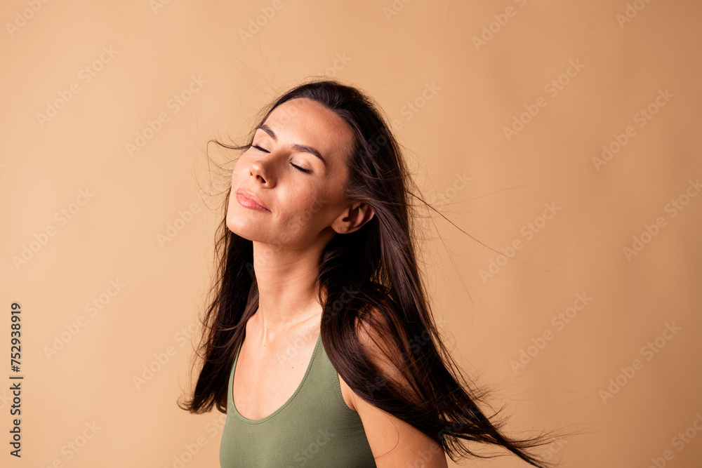 Photo of pretty charming lady closing eyes enjoying fresh haircut after applying pampering shampoo isolated pastel color background Photo of pretty charming lady closing eyes enjoying fresh haircut after applying pampering shampoo isolated pastel color background