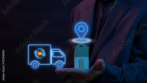Businessman showing house model with animation of truck car with 24hrs icon. Concept of transportation, distribution, global logistics network, import-export, delivery and shipping, worldwide business photo