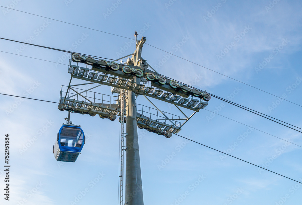 funicular road with a cabin on a background of blue sky funicular road with a cabin on a background of blue sky