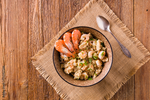 Traditional Portuguese bread soup with shrimp.. AÇORDA ALENTEJANA. photo