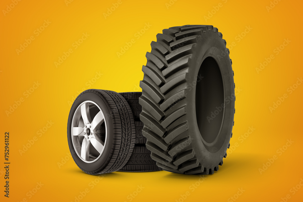 Contrast of Large Industrial and Small Car Tire