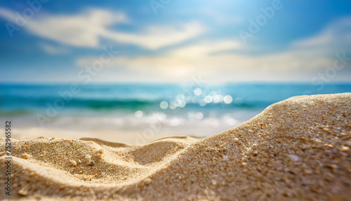 Close up sand with blurred sea sky background  summer day  copy space or for product. Summer