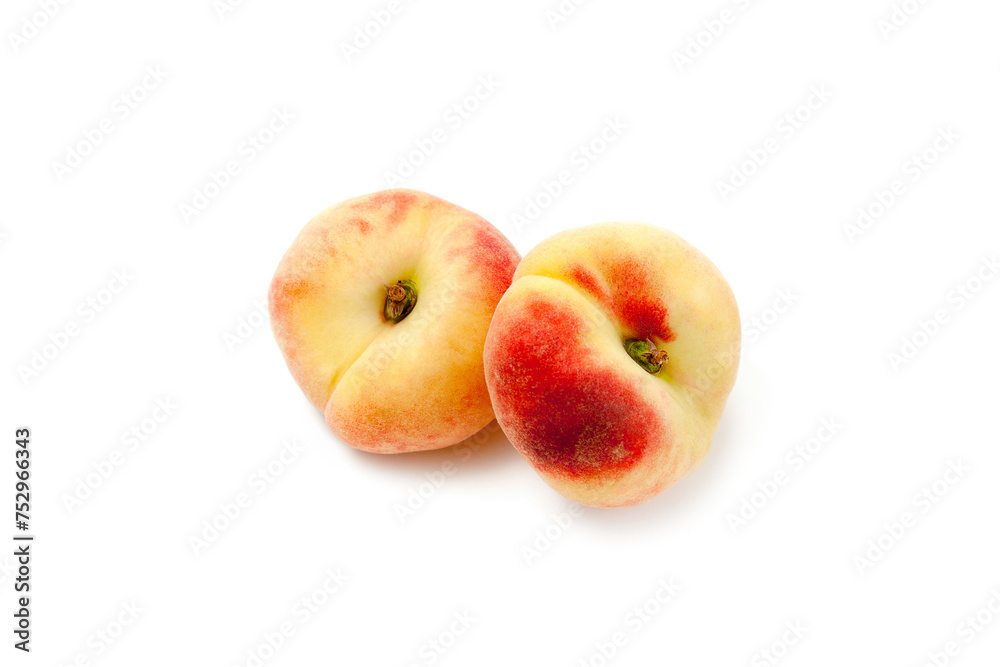 Two saturn peaches or flat peaches isolated on white background with clipping path.. Two saturn peaches or flat peaches isolated on white background with clipping path..
