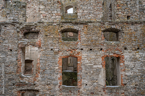 Old castle wall with windows. Old castle wall with windows and shutters.