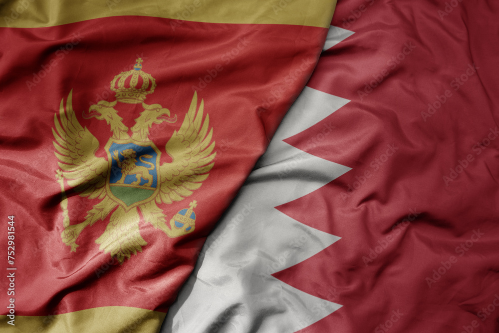 big waving national colorful flag of bahrain and national flag of montenegro . big waving national colorful flag of bahrain and national flag of montenegro .
