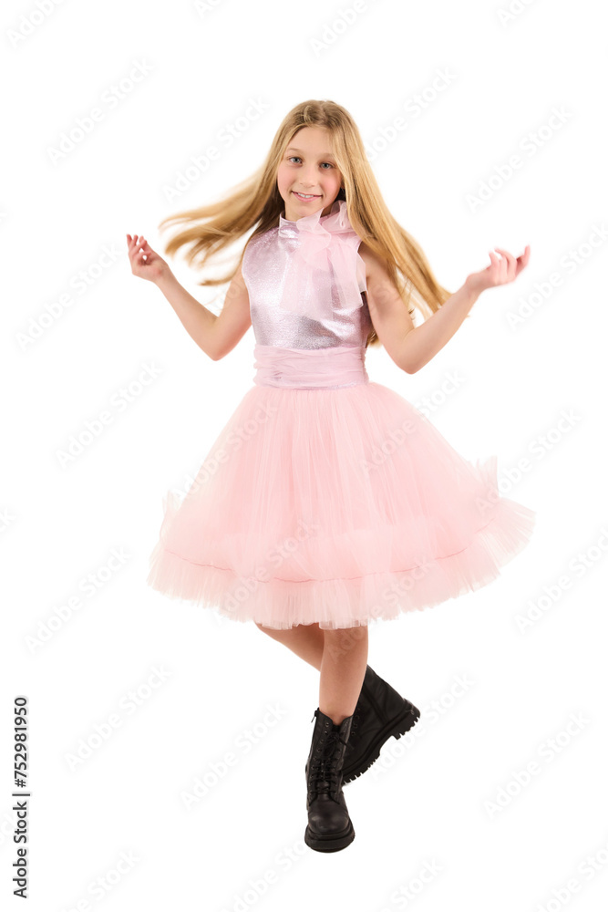Young girl posing in elegant pink dress