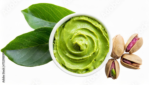 Tasty pistachio cream, green leaves and nuts isolated on white, top view