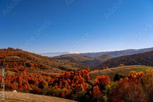 beautiful autumn landscapes in the Romanian mountains, Fantanele village area, Sibiu county, Cindrel mountains, Romania photo