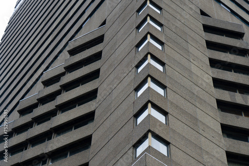 Exterior building wall of abstract concrete geometric pattern, an example of brutalistic architecture. 
Brutalism as an architecture style in Quebec city in Canada. Brutalist architecture Canada.