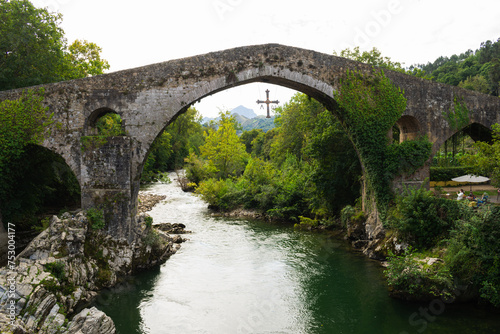 Roman bridge of Cangas de Onis over the river Sella. Asturias - Spain photo