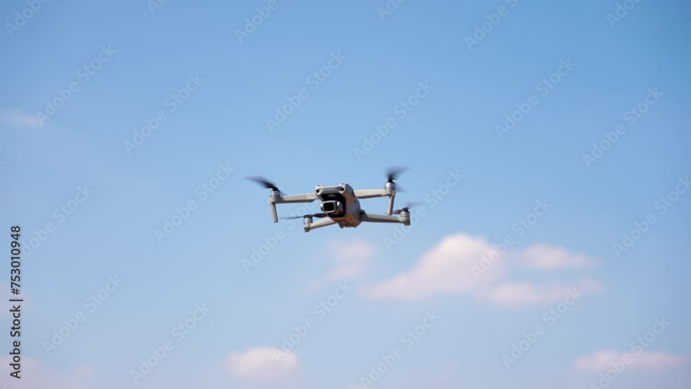 Drone copter with a digital camera flies to take high-angle photos. Drone copter with a digital camera flies to take high-angle photos.