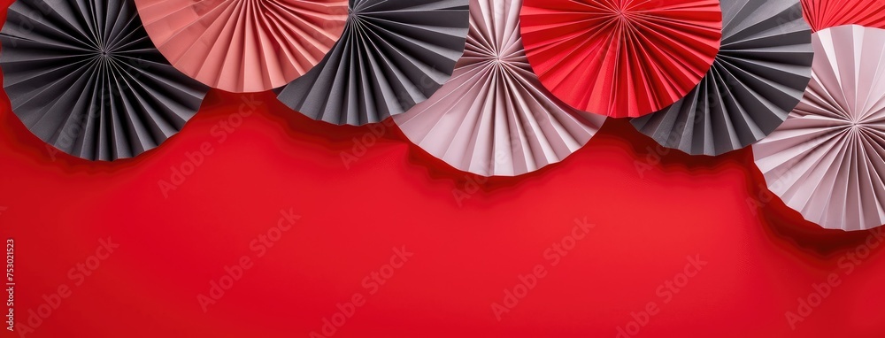 Elegant Accordion Fold Paper Design on Red