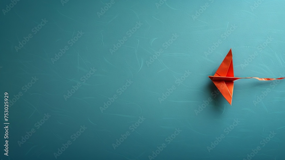 Origami glider ascends a crimson line against a turquoise canvas with fluffs